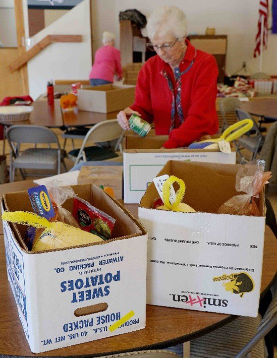 Helping with Thanskgiving Boxes.jpg